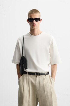 SWEATSHIRT WITH EMBROIDERY AND SLOGANS