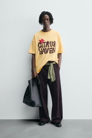 SWEATSHIRT WITH PRINTED SLOGANS